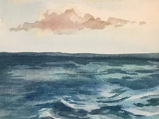 watercolor of calm sea with a few fluffy clouds overhead