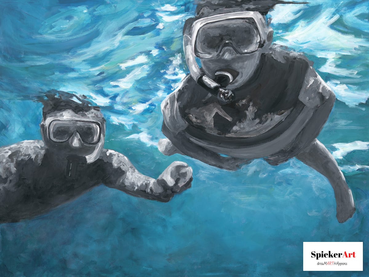 Young boy and his Dad snorkeling