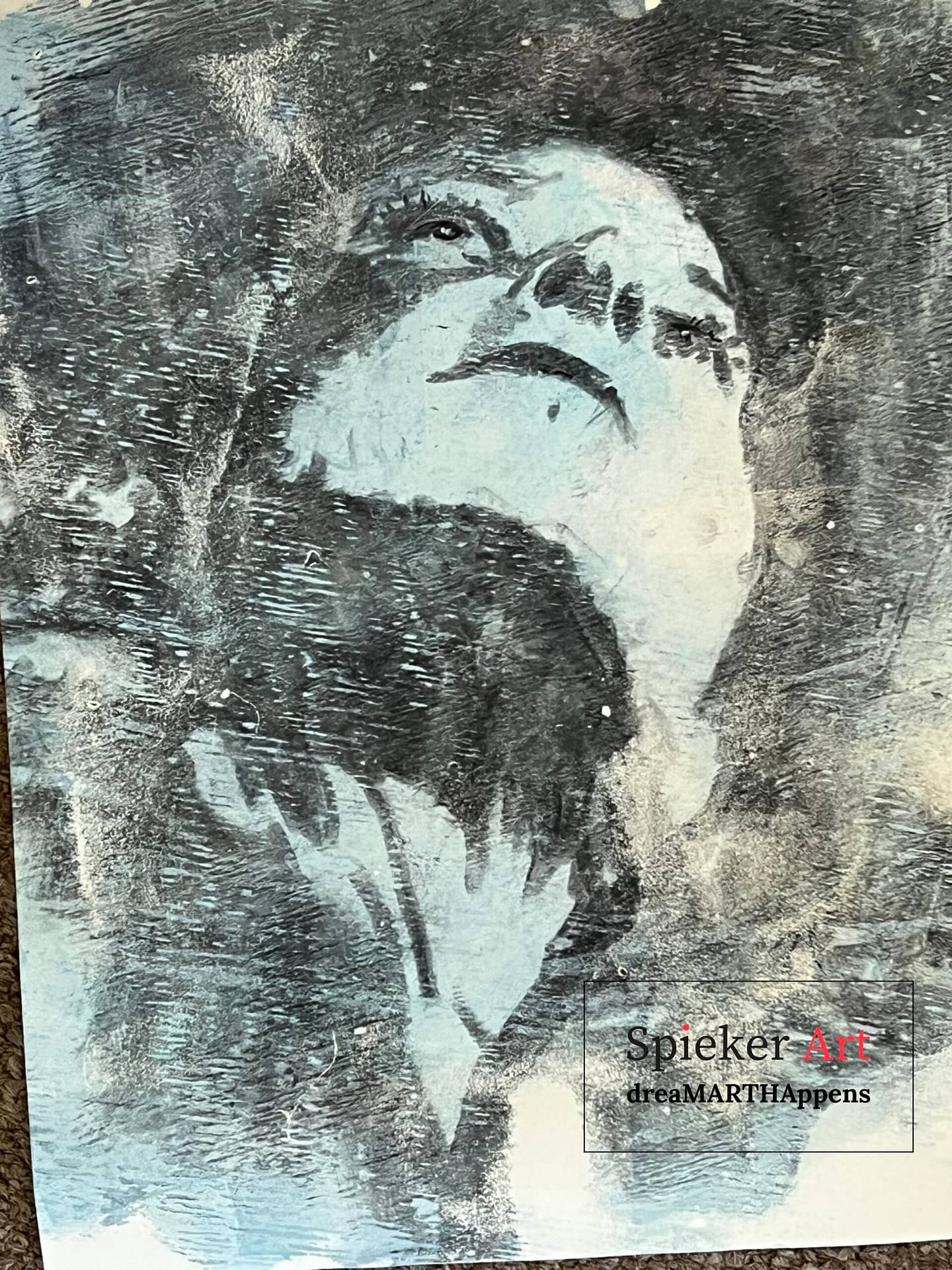 charcoal drawing of a woman looking up